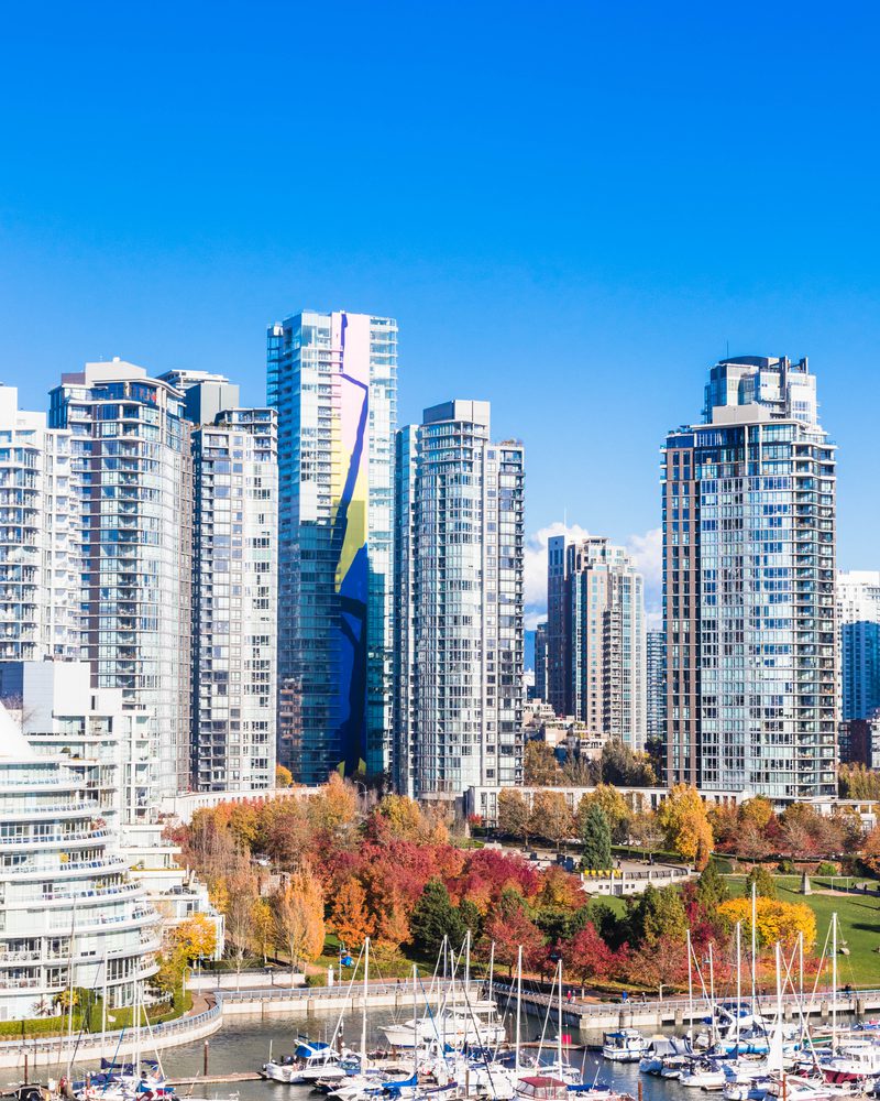 City skyline and harbour under blue sky